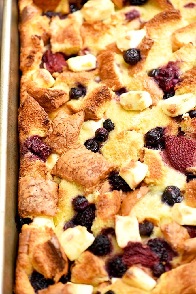 Mixed Berry French Toast Bake is easy to make and ready in an hour with no overnight chilling needed. With delicious pockets of berries and cream cheese, and topped with fruit sauce, it's perfect for breakfast or brunch.