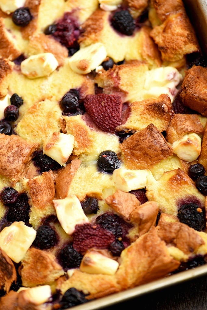 Berry French Toast Bake with cream cheese and fruit sauce for the perfect breakfast or brunch!