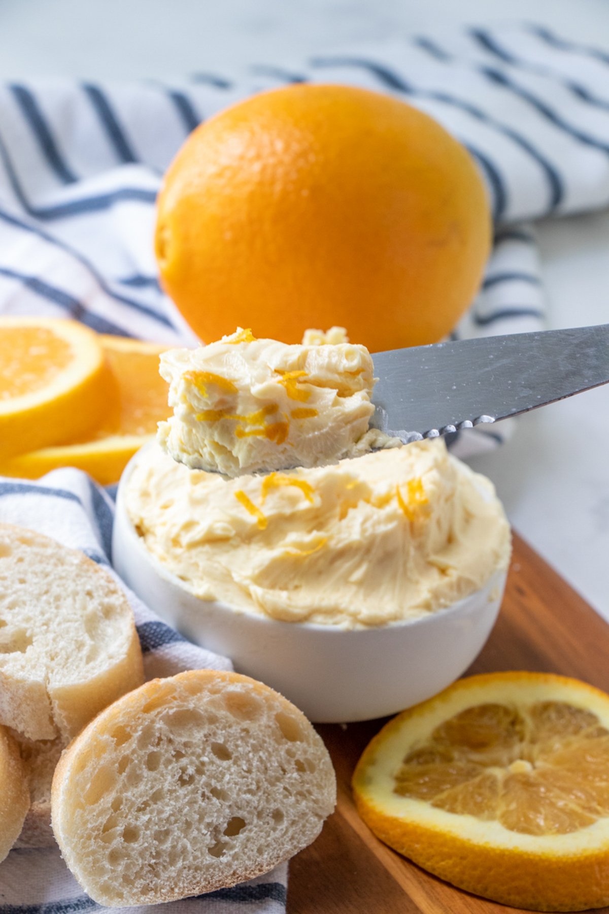 serving orange butter with a spatula