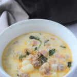 Tuscan soup in a white bowl