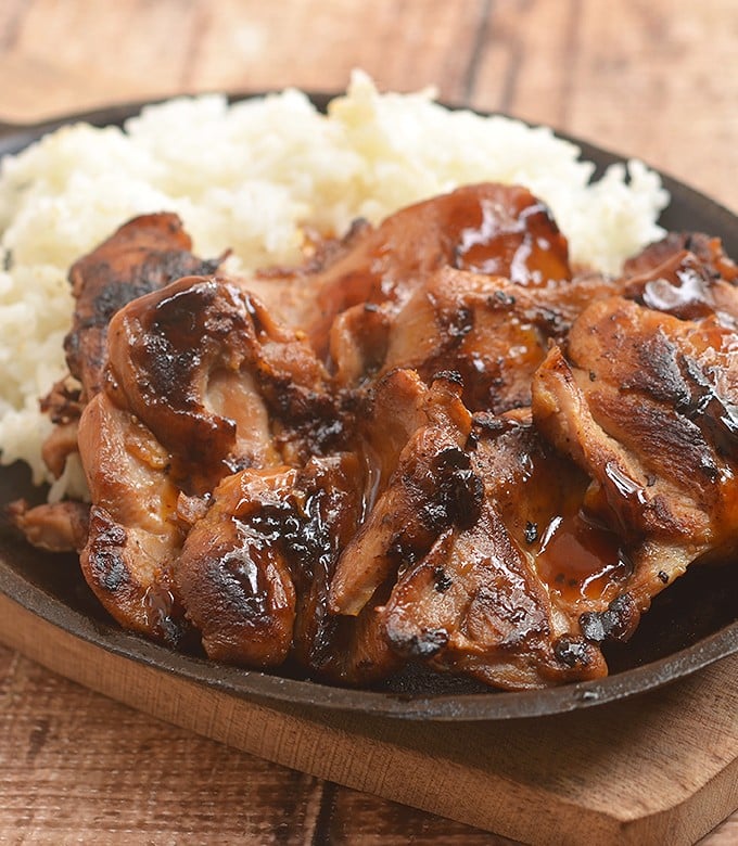 Sweet Mango Barbecue Chicken with a sweet and tangy marinade that's out of this world! Juicy, flavorful, and with a tropical twist, it's a must for your summer BBQ's!