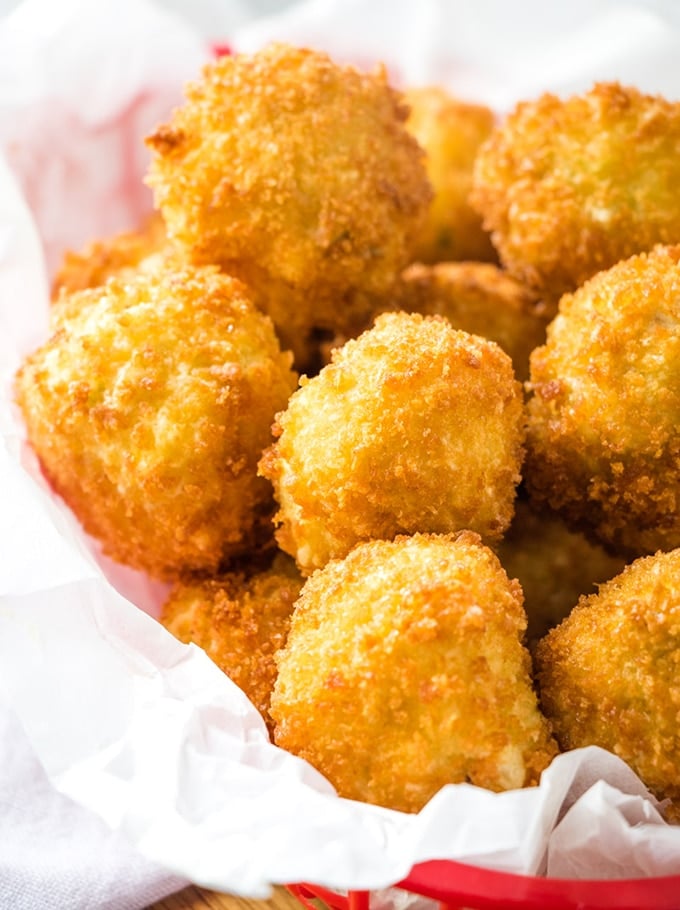 Chicken Potato Croquettes in a red plastic serving basket