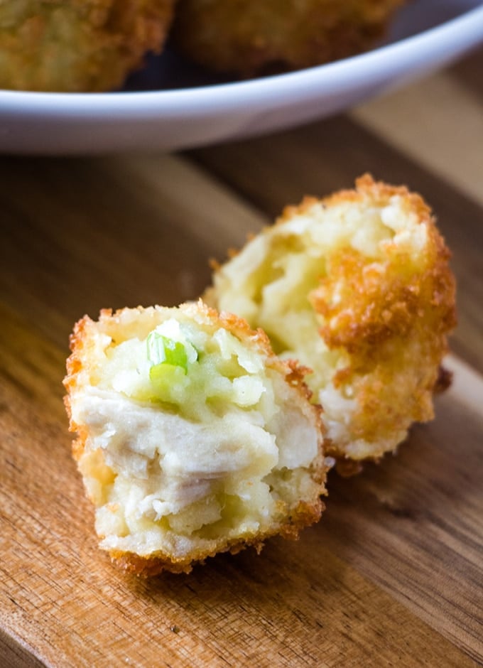 halved Chicken Potato Croquette on a wooden board