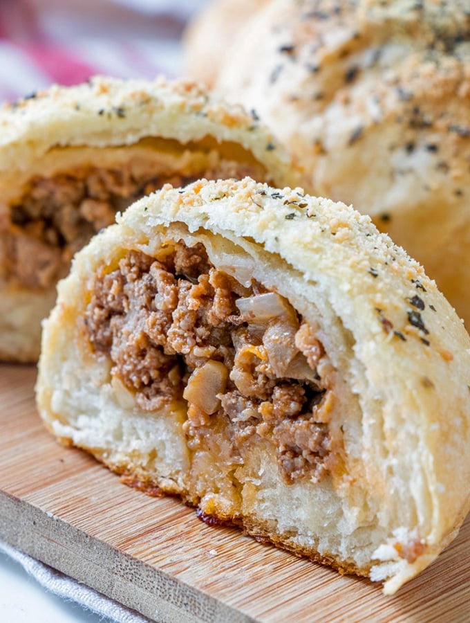 bread roll half with sloppy joe beef filling