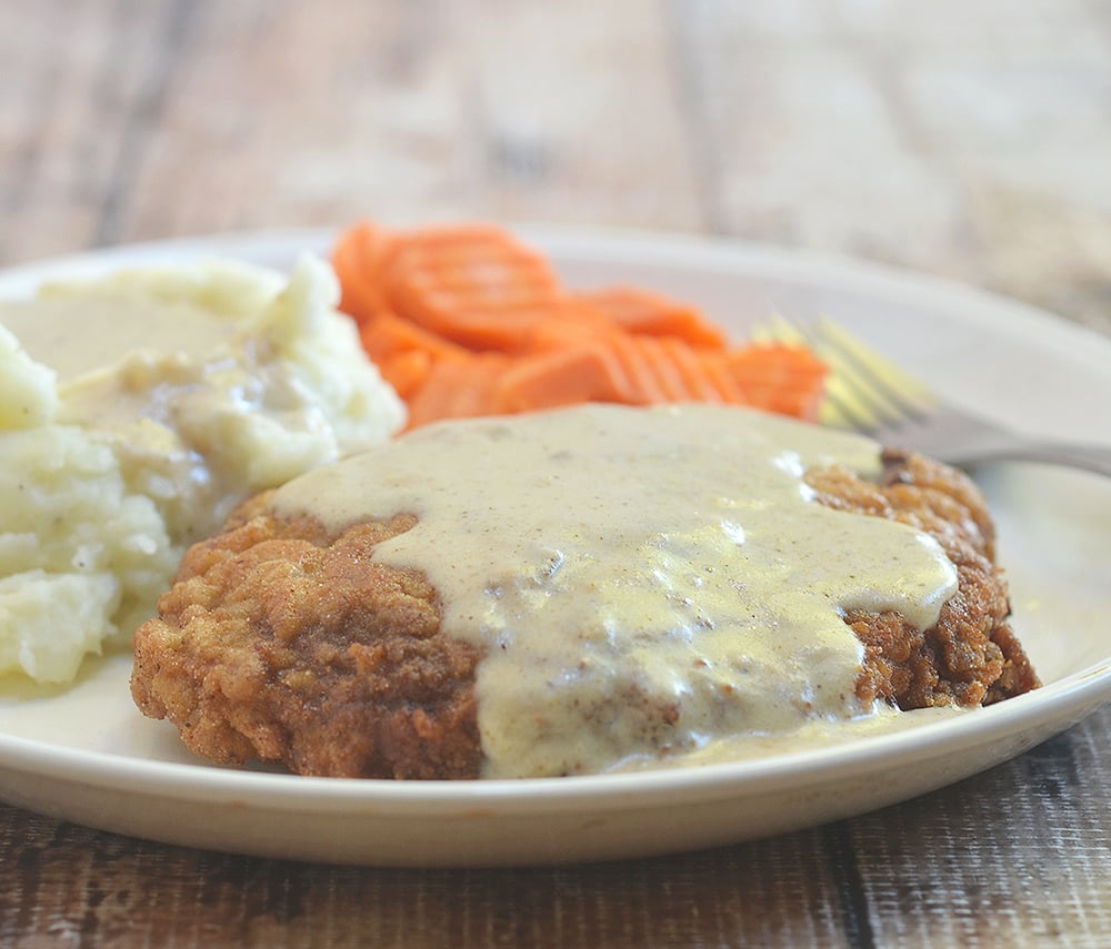 Chicken Fried Steak with cream gravy is crispy, super tender, and the perfect breakfast, lunch or dinner meal!