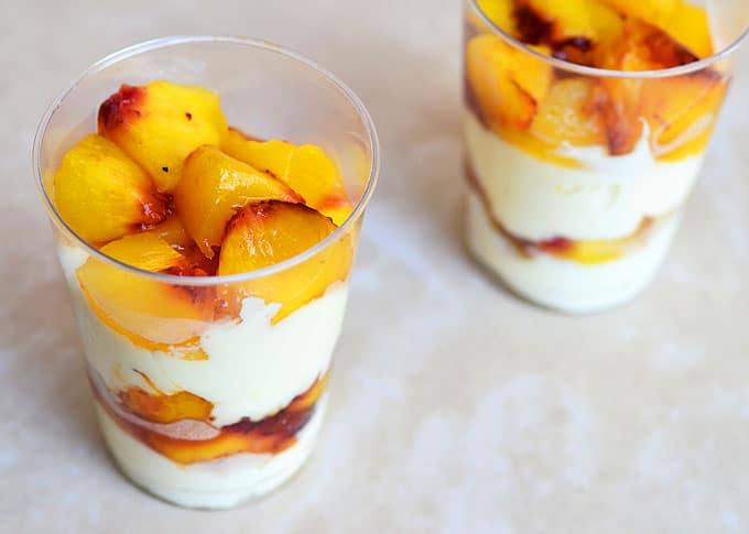 Grilled Peaches and Cream with delicious layers of juicy peaches, balsamic glaze, and sweetened cream is a quick and easy summertime treat you'll love!