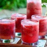 Minty Watermelon Cooler made with fresh watermelon, lime juice, and mint is a delicious way to beat the heat! A few splashes of vodka or rum easily turn it into a grown-up cocktail!