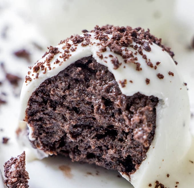 bitten Oreo Truffle Balls with white chocolate shell