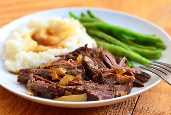 Slow Cooker Cola Roast with sweet, spicy flavors and moist, tender meat. Cooked in the crockpot, it's a hands-off meal for easy weeknight dinners.