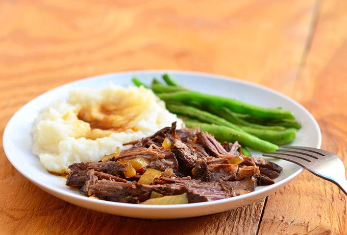 Slow Cooker Cola Roast with sweet, spicy flavors and moist, tender meat. Cooked in the crockpot, it's a hands-off meal for easy weeknight dinners.