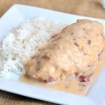 Slow Cooker Mushroom Chicken wrapped in bacon and cooked in the crockpot with cream of mushroom and chipped beef. Perfect with rice, noodles or mashed potatoes.