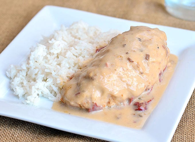 Slow Cooker Mushroom Chicken wrapped in bacon and cooked in the crockpot with cream of mushroom and chipped beef. Perfect with rice, noodles or mashed potatoes.