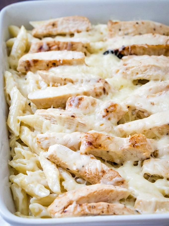 Chicken Alfredo Casserole in white baking dish