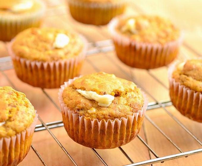 Pumpkin Cream Cheese Muffins filled with creamy cream cheese and apricot preserves. Bursting with Fall flavors, they're amazing for breakfast or anytime you need a sweet treat!