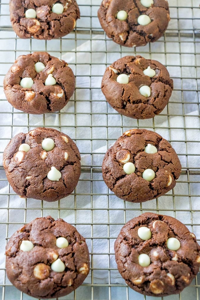 white chocolate chip cookies on a wire rack to cool