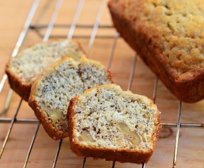 sliced mini banana bread loaves on a baking rack