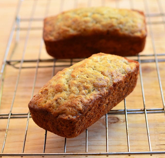 mini banana bread loaves on a cooling rack