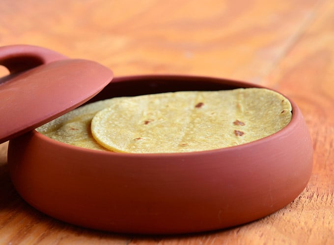 Delicious homemade corn tortillas in a tortilla warmer. 