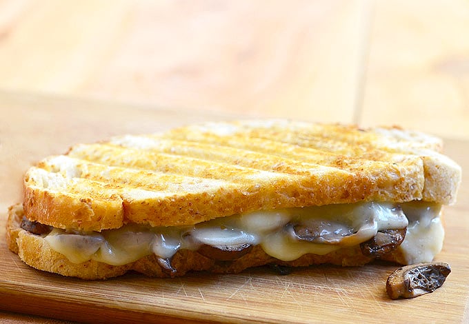 Grilled Portabella Sandwich Melt with meaty mushrooms and gooey Provolone cheese on toasted French bread is the easiest and tastiest sandwich you can make! Perfect for a midday snack or light lunch!