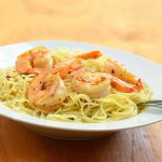 Garlic Butter Shrimp Pasta with shrimps in garlic butter sauce served over al dente pasta. Ready in minutes and with the most amazing flavor, it's the perfect weeknight dinner!