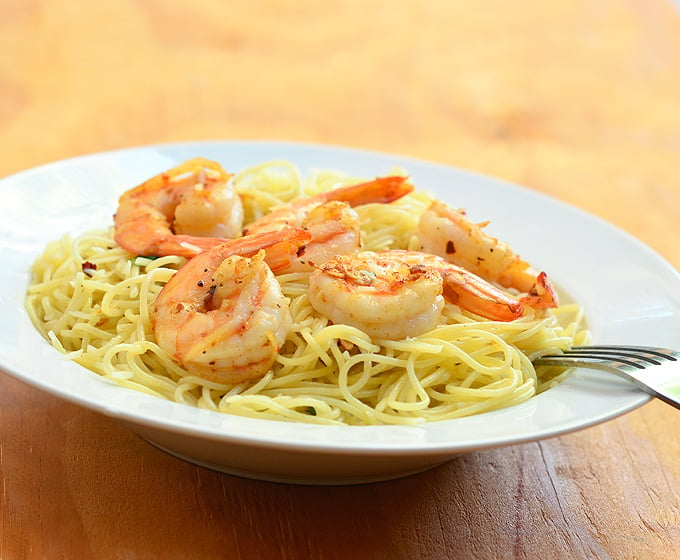 Garlic Butter Shrimp Pasta with shrimps in garlic butter sauce served over al dente pasta. Ready in minutes and with the most amazing flavor, it's the perfect weeknight dinner!