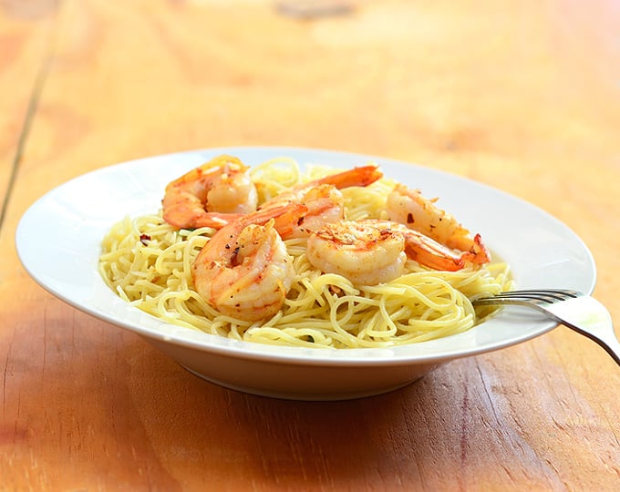 Garlic Butter Shrimp Pasta with shrimps in garlic butter sauce served over al dente pasta. Ready in minutes and with the most amazing flavor, it's the perfect weeknight dinner!