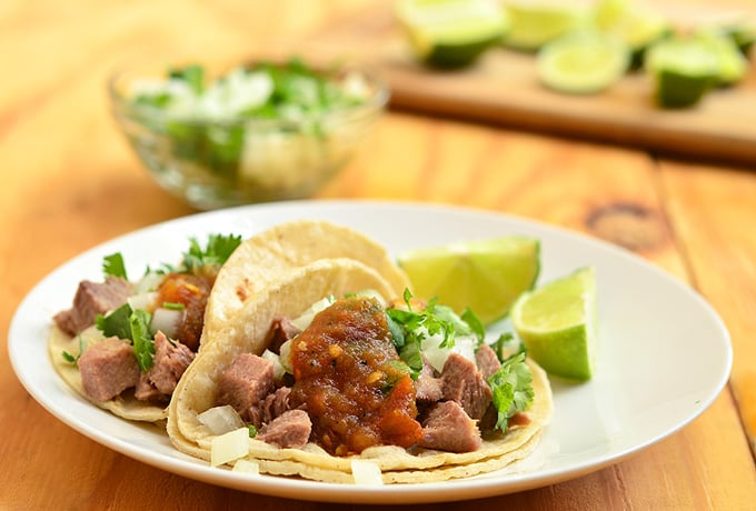 Tacos de Lengua with melt-in-your-mouth tender ox tongue, corn tortillas and your favorite taco fixings! Moist and flavorful, they're one of the best tacos you'll ever have!