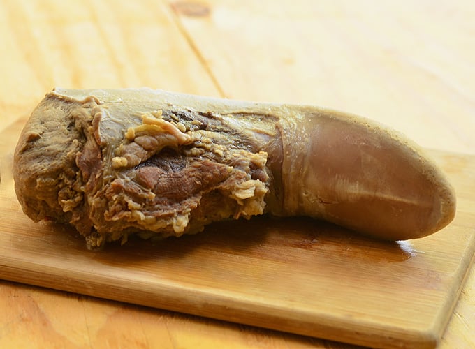 Cooked ox tongue ready to cut for tacos de lengua