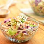 Peanut coleslaw with cabbage, carrots, celery, green onions, and crunchy peanuts dressed in a tangy vinaigrette dressing. A delicious Wood Ranch BBQ and Grill copycat recipe, it's sure to wow the crowd!