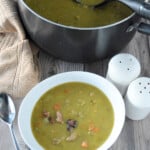 Split Pea and Ham Soup in pot and white bowl