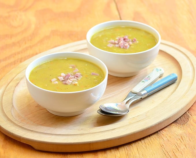 Split Pea and Ham Soup is made extra tasty with ham bone, carrots, celery, and onions. Thick, hearty, and flavorful, it’s nutritious and delicious!