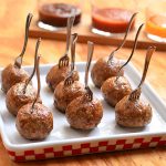 Italian meatballs perfect as party appetizers with dipping sauces or served over pasta with hearty marinara sauce. Learn the easy tips on how to make them super moist and flavorful!