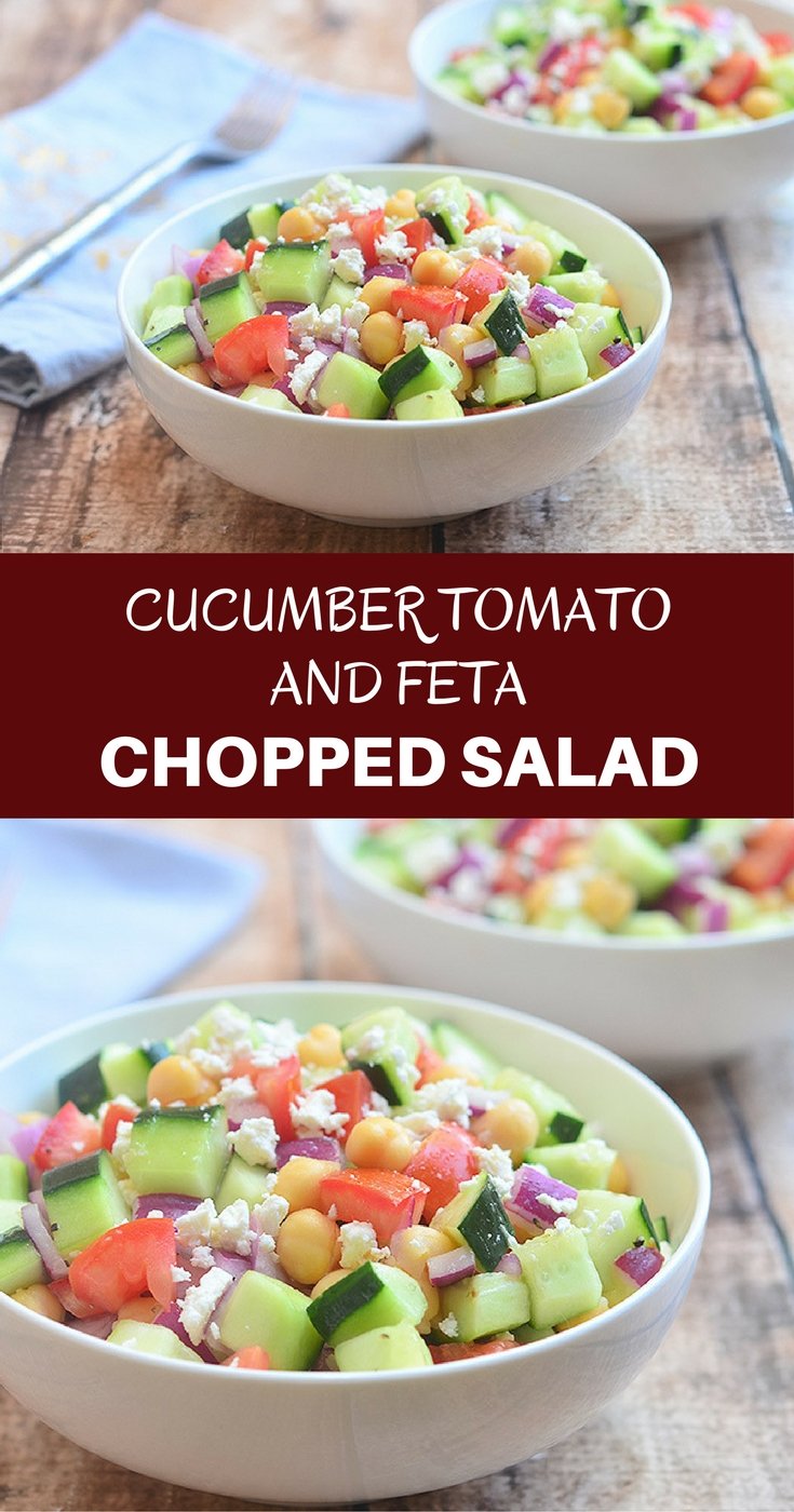 Cucumber Tomato and Feta Salad with crisp cucumbers, tomatoes, garbanzo beans, and red onions tossed in a tangy red wine vinaigrette. Chock-full of amazing texture and flavor, it's sure to be a hit with the crowd!