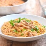 Cheesy Spaghetti with creamy tomato sauce is quick and easy to make for busy weeknights and with loads of delicious cheesy flavor the whole family is sure to love.