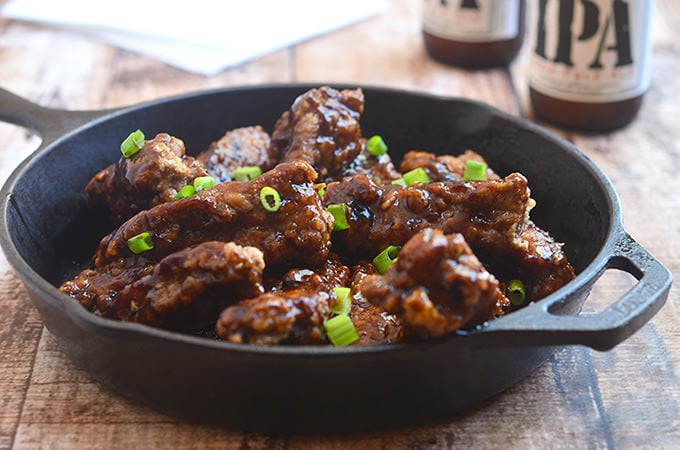 Asian Coffee Ribs fried until golden and crisp and then coated with coffee flavored sauce for an Asian-inspired appetizer or dinner meal. Moist, tender, and flavorful, they're finger-licking delicious!