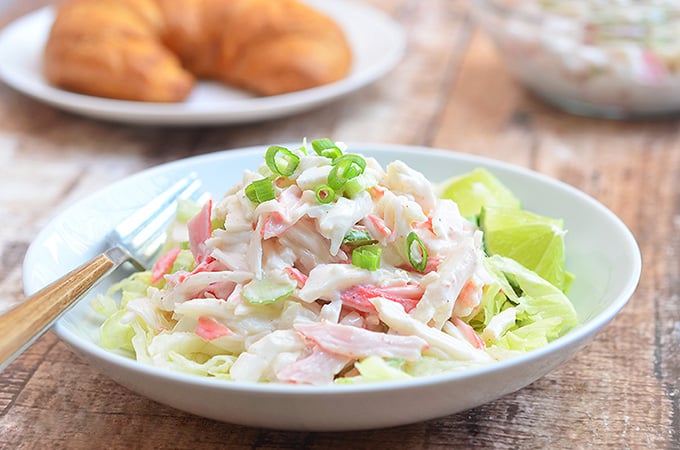 Kani Salad with imitation crab and celery in a creamy mayo dressing is a refreshing seafood salad that's sure to be family favorite. It's ready in minutes and can be enjoyed as is, tossed with salad greens or used as sandwich fillings.