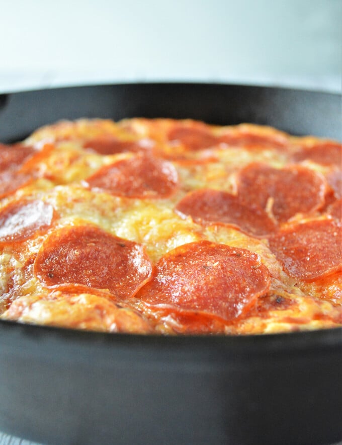 Pepperoni Bubble Pizza baked in a cast iron skillet.