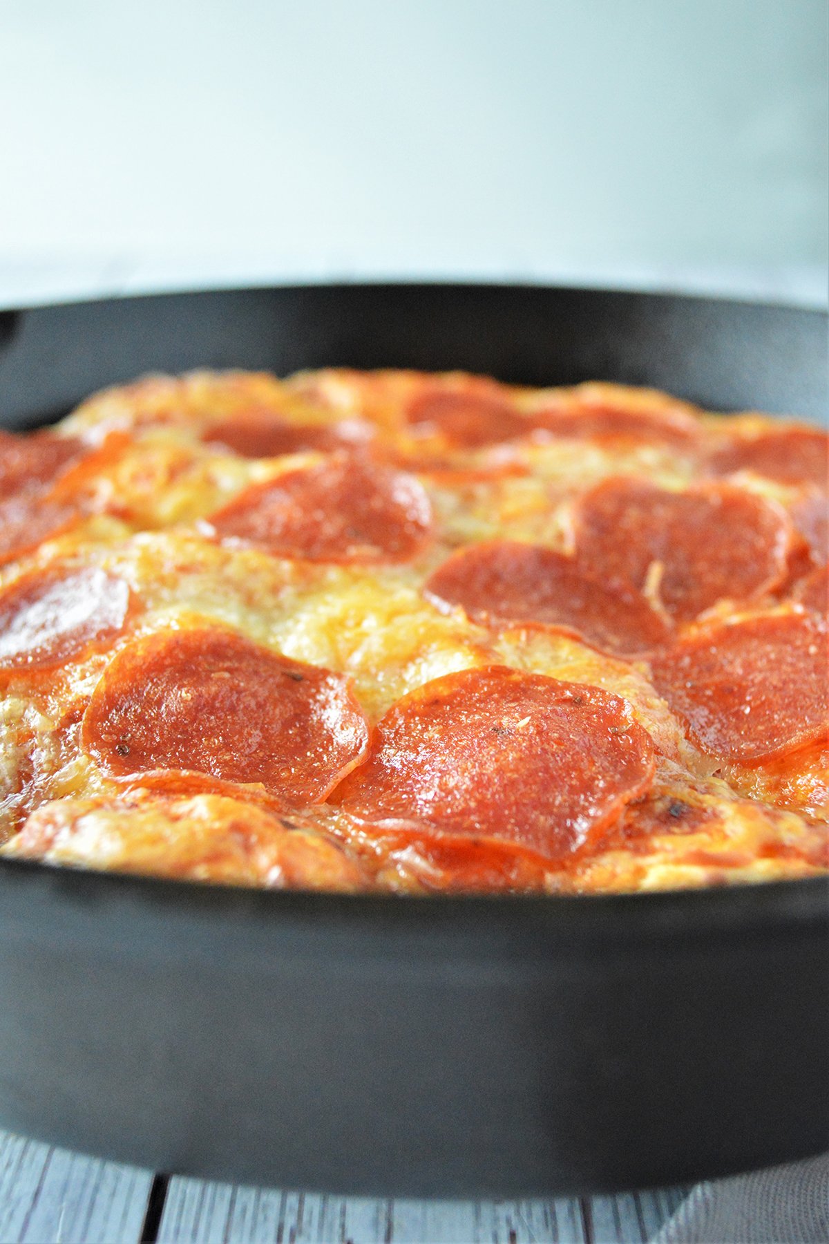 Pepperoni Bubble Pizza baked in a cast iron skillet