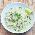 Cilantro Rice jazzed up with lime juice, lime zest and chopped cilantro for delicious, refreshing flavor. It's the perfect side for all your favorite Mexican entrees!