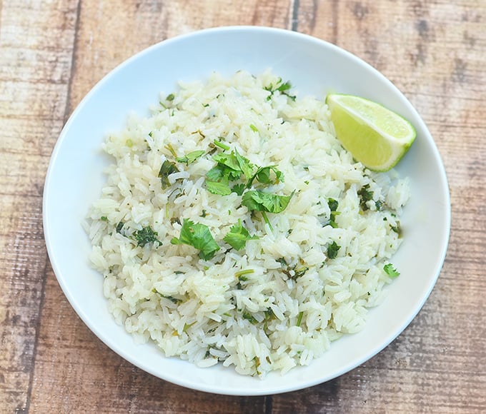 Cilantro Rice jazzed up with lime juice, lime zest and chopped cilantro for delicious, refreshing flavor. It's the perfect side for all your favorite Mexican entrees!