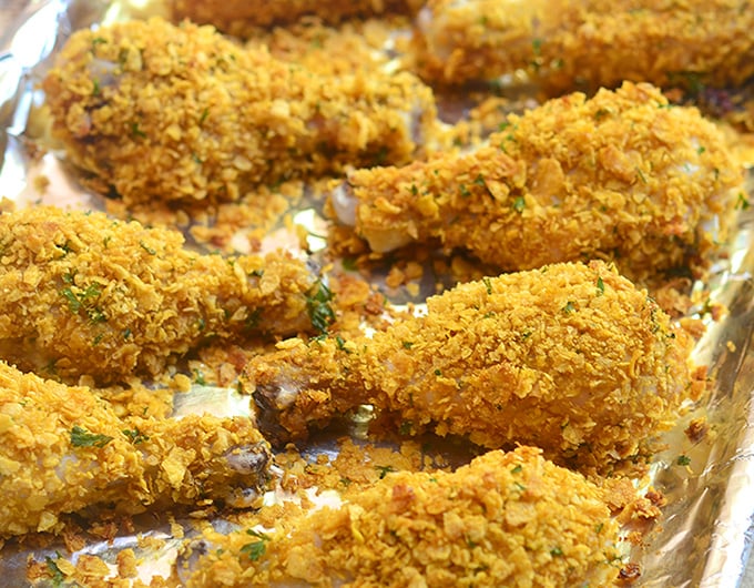 Cornflake chicken coated in cornflake crumbs for crunchy, juicy chicken perfection without deep-frying. Loads of flavor with less work and less fat!