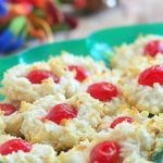 Coconut macaroons with colorful maraschino cherry centers make the perfect gift this holiday season. Soft and chewy, they're sure to be everyone's favorite treat!