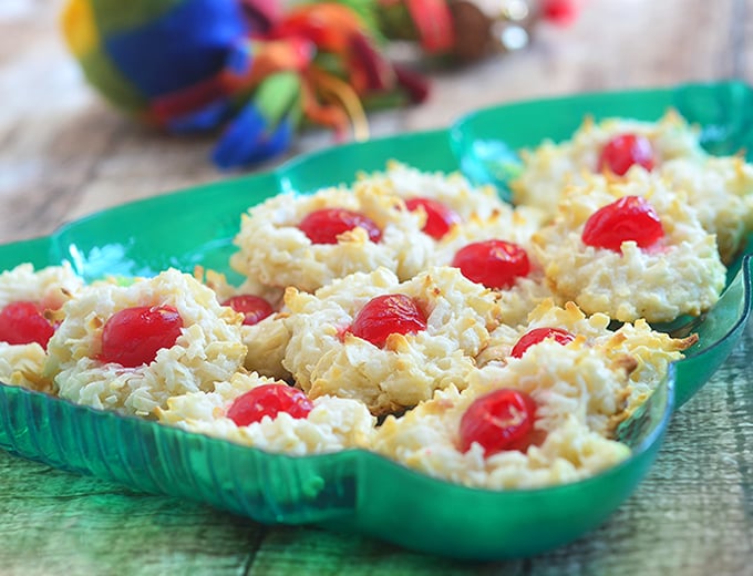 Coconut macaroons with colorful maraschino cherry centers make the perfect gift this holiday season. Soft and chewy, they're sure to be everyone's favorite treat!