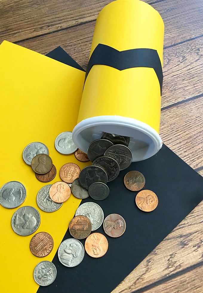 DIY Charlie Brown Coin Bank is perfect for teaching your child how to save. Super easy and fun to make using simple craft supplies.