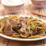 Mongolian Beef is a delectable medley of tender beef and fragrant scallions in a sweet and savory sauce. So easy to make at home yet tastes so much better than take-out!