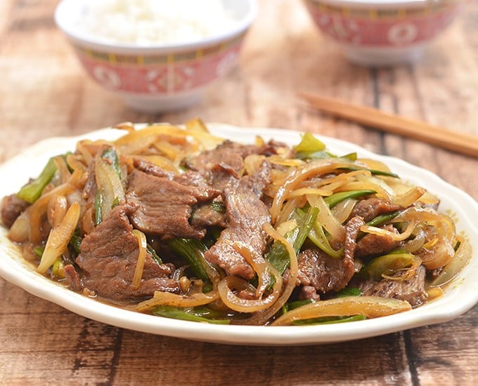 Mongolian Beef is a delectable medley of tender beef and fragrant scallions in a sweet and savory sauce. So easy to make at home yet tastes so much better than take-out!