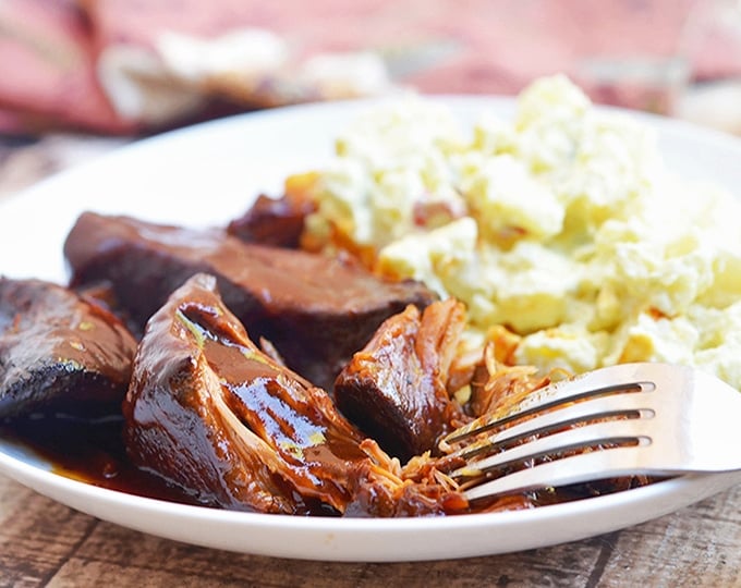 Country Style Ribs cooked in the slow cooker with homemade BBQ sauce for super tender, flavorful meat
