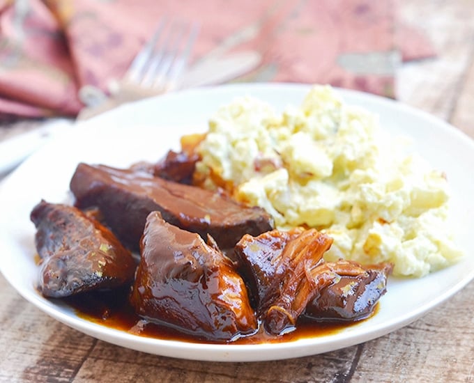 Slow Cooker BBQ Country Style Ribs with homemade BBQ sauce cooked to perfection in the crockpot. They're melt-in-your-mouth tender and loaded with sweet and tangy flavors!