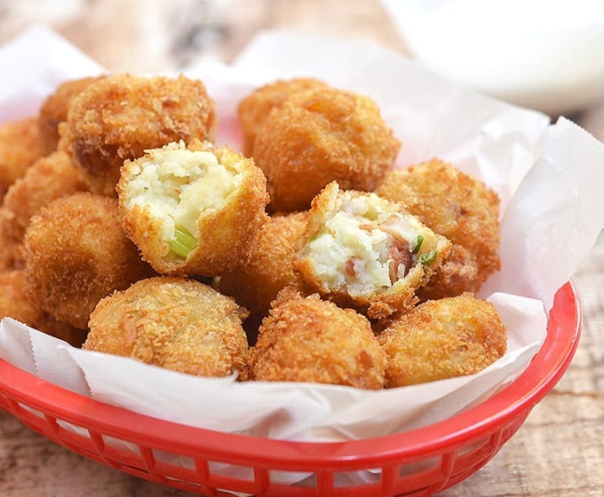 loaded mashed potato croquettes with cheese, bacon and green oinons