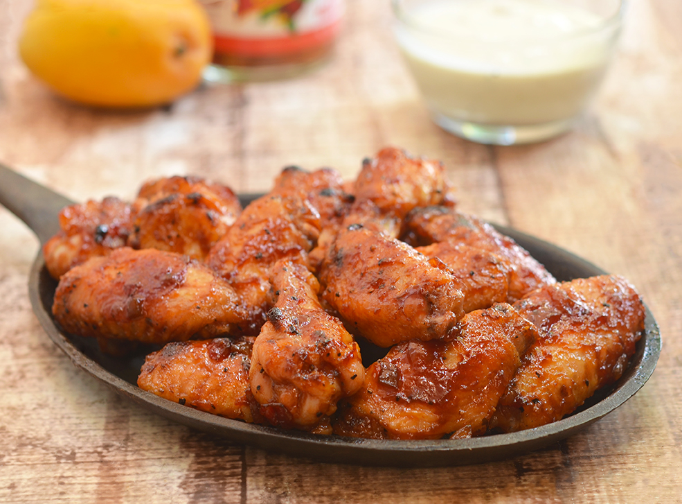 These mango habanero chicken wings with curry yogurt dip are delicious and irresistible! 